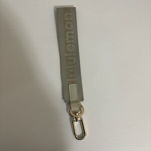 Lululemon Gray & Gold Keychain